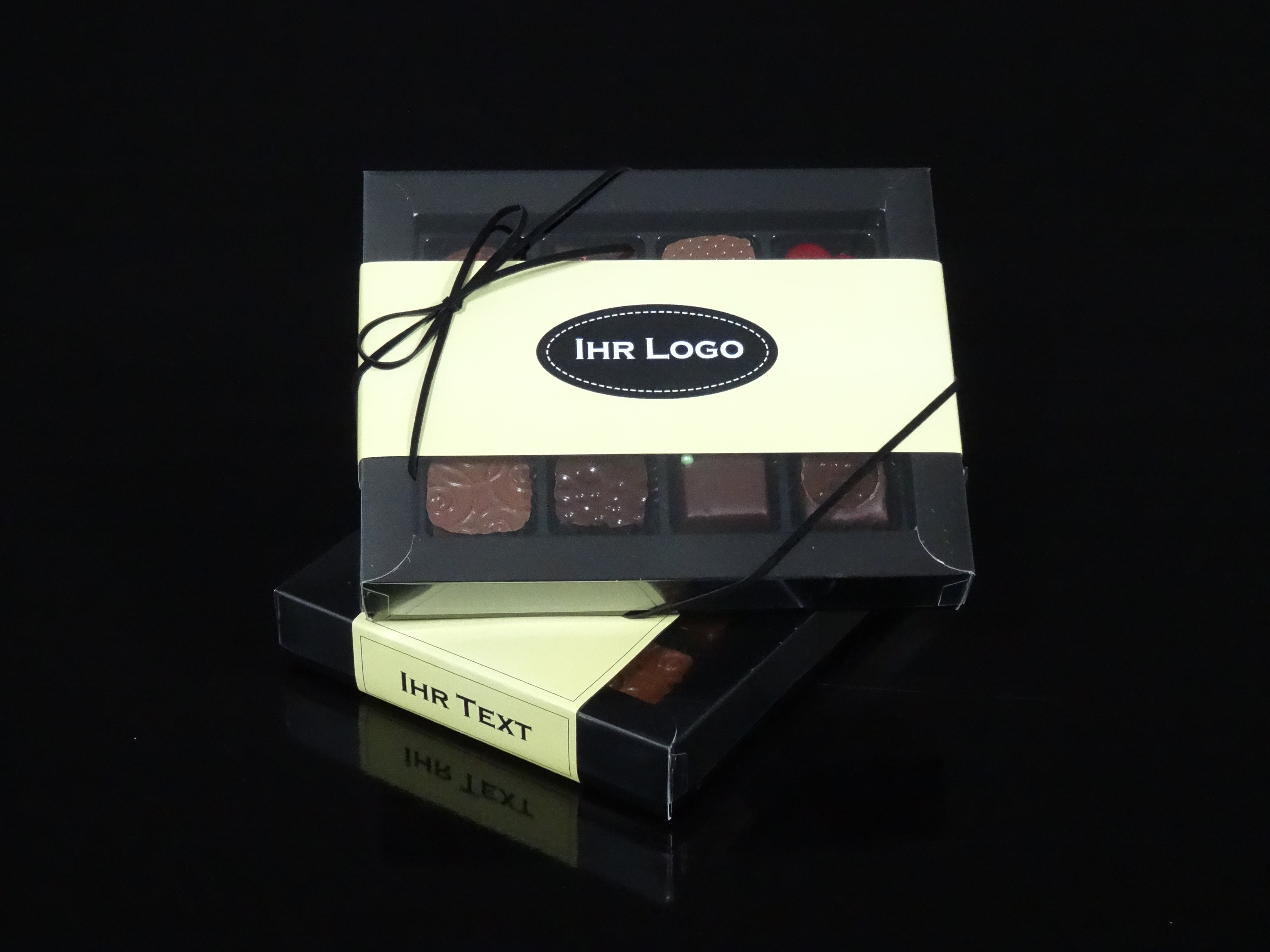 Pralinés-Klarsichtschachtel individualisiert mit Firmenbanderole